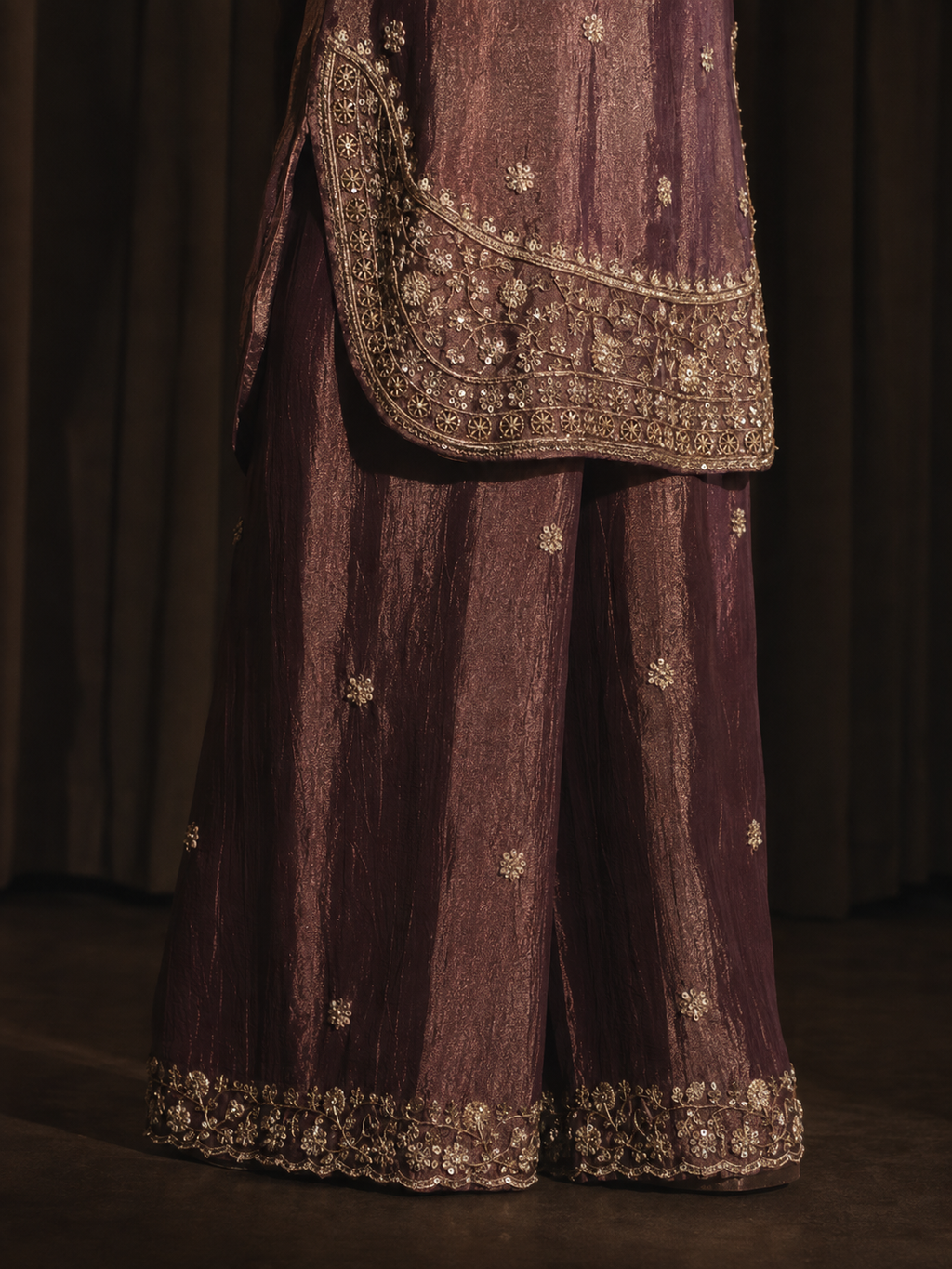 Nayab palazzo and kameez hem detail — antique gold sequin and thread embroidery on plum tissue silk