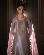 Meher lilac tissue silk kurta set by ILARA — backlit editorial view of antique gold zardozi placket and sheer scalloped dupatta