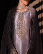 Full-length view of Meher lilac tissue silk kurta set with zardozi hem border and wide-leg trousers