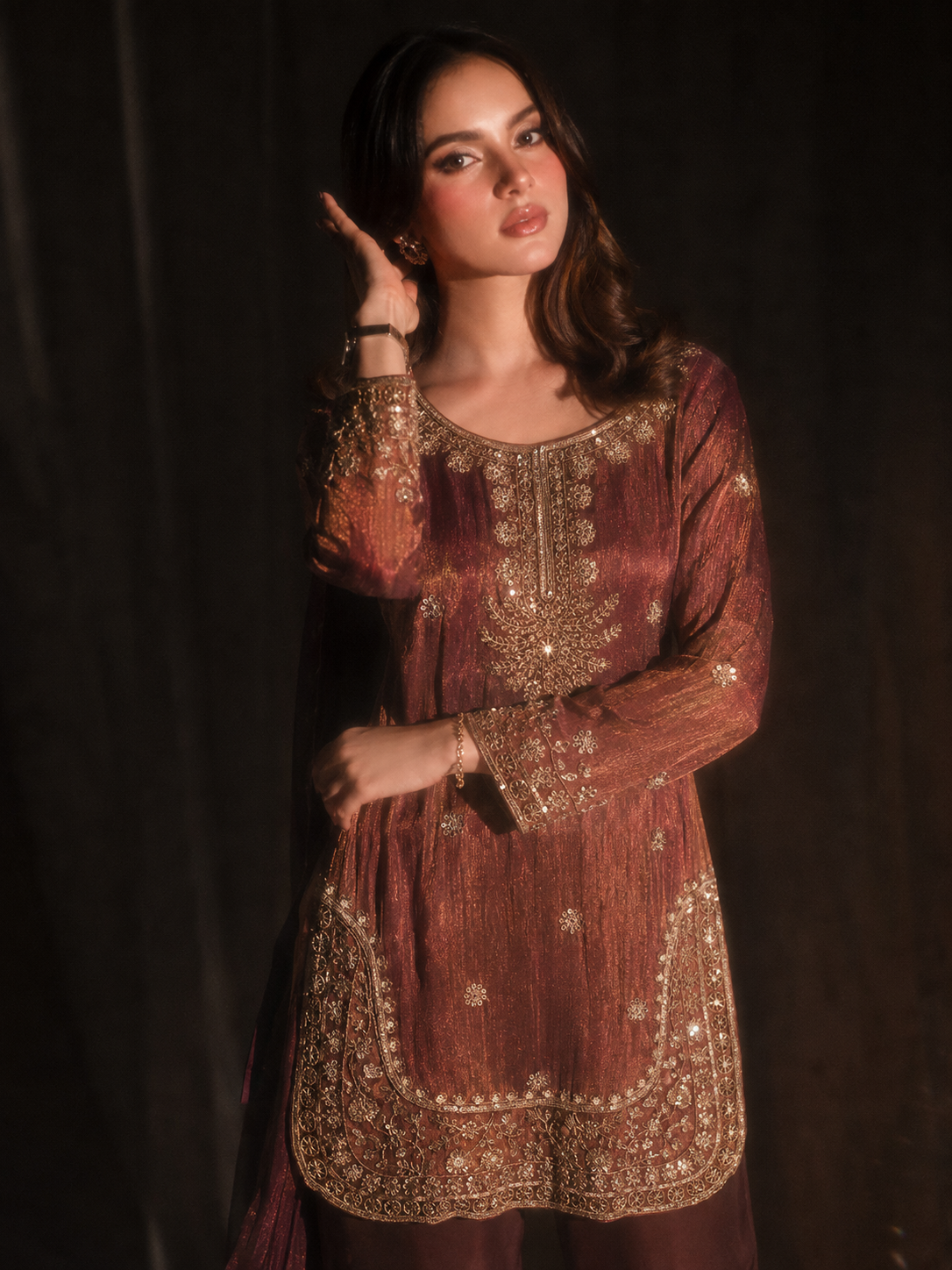 Ambreen rust raw silk suit styled for a Pakistani wedding, alternate view