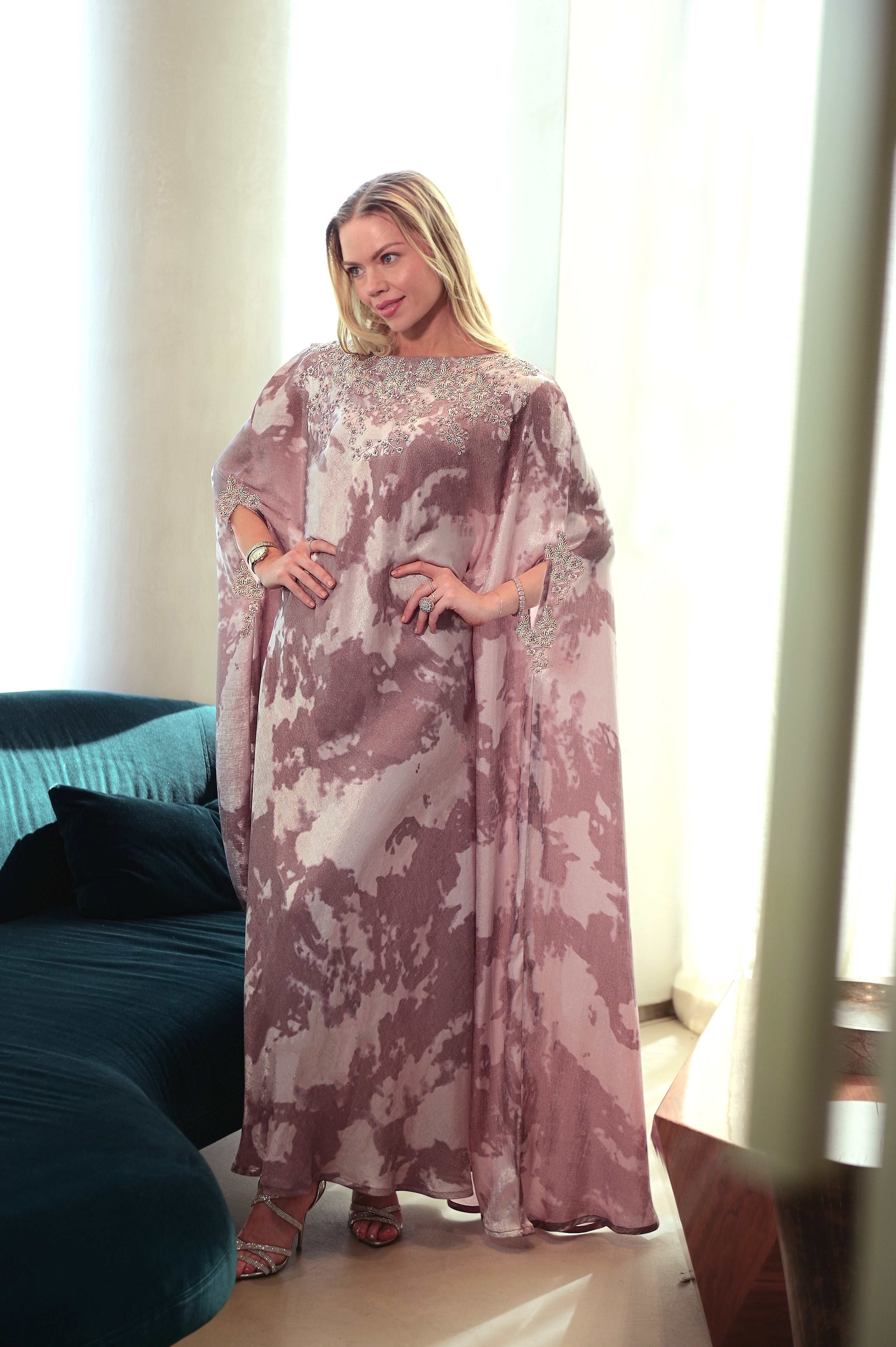 Woman wearing a patterned dress for Eid and modest events
