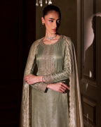 Close up of hand embroidered gold dabka and zardozi work on sage tissue silk kurta with champagne tissue dupatta