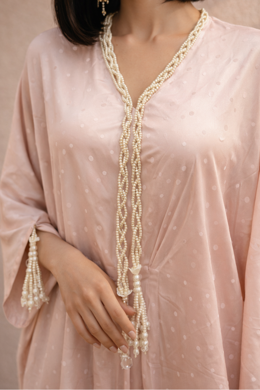 Mahnoor blush sand kaftan, fabric and neckline detail